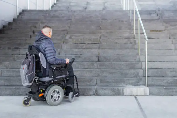 how to get a wheelchair up and down stairs