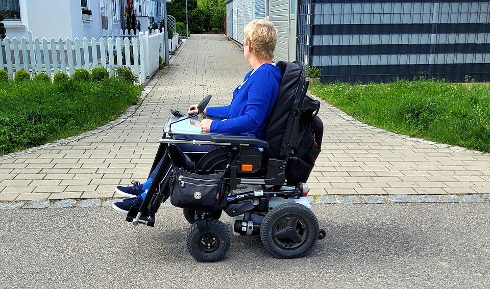 how far can an electric wheelchair go