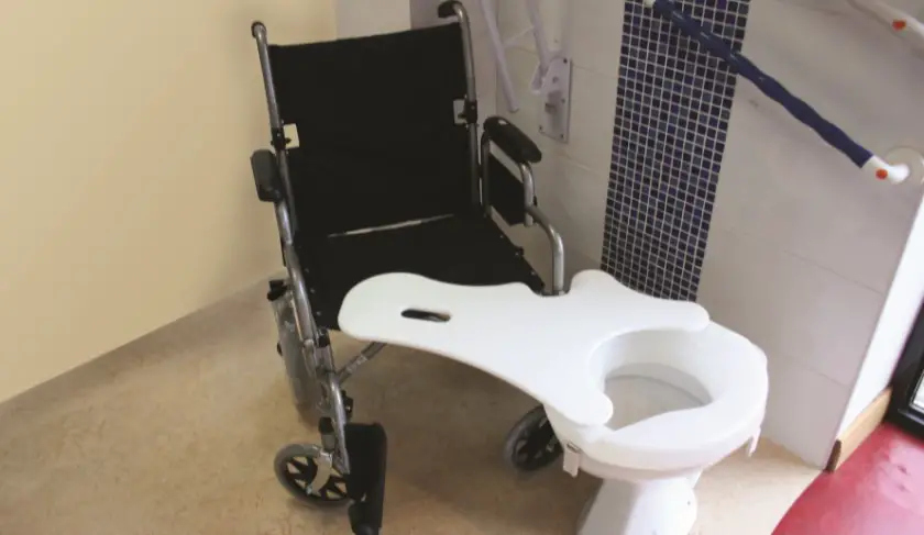 how to use transfer board from wheelchair to toilet