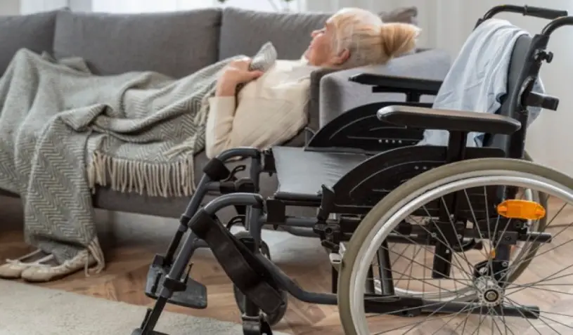 how to transfer a senior from wheelchair to bed safely